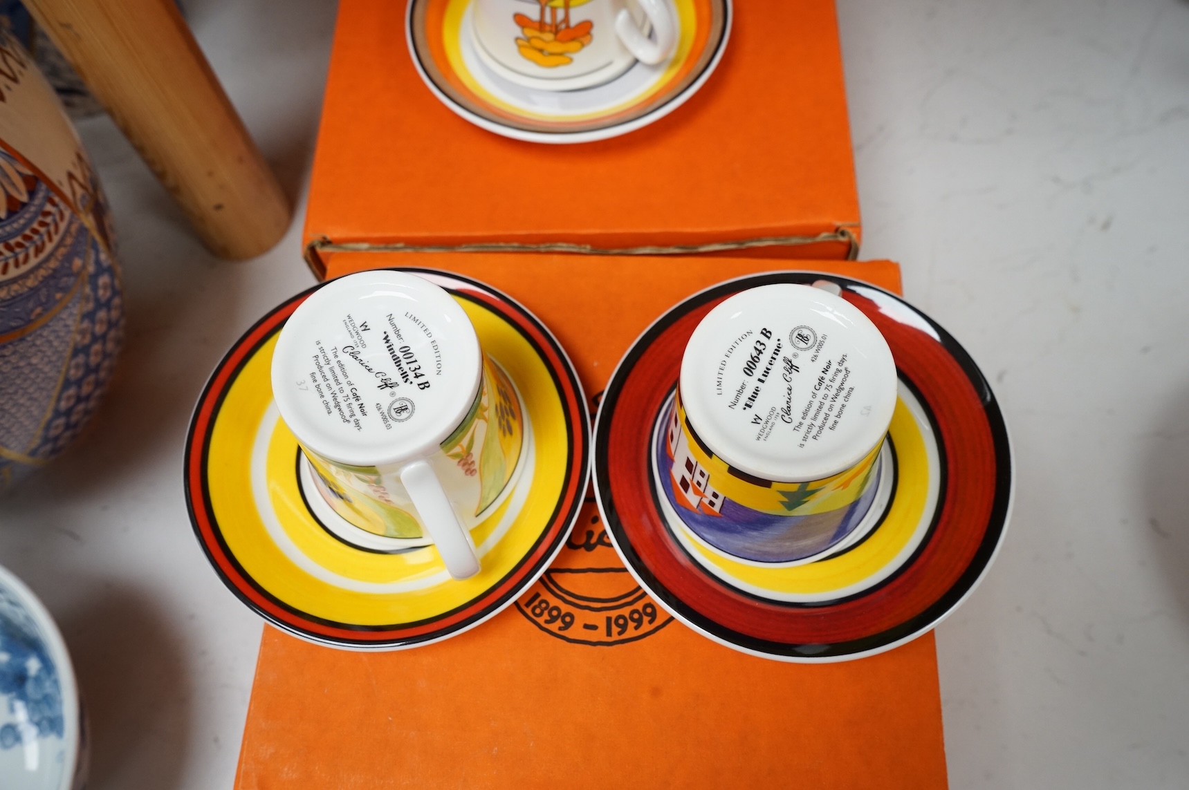 Four boxed limited edition Clarice Cliff cups and saucers to include Blue Lucerne and Windbells, saucers 11cm in diameter